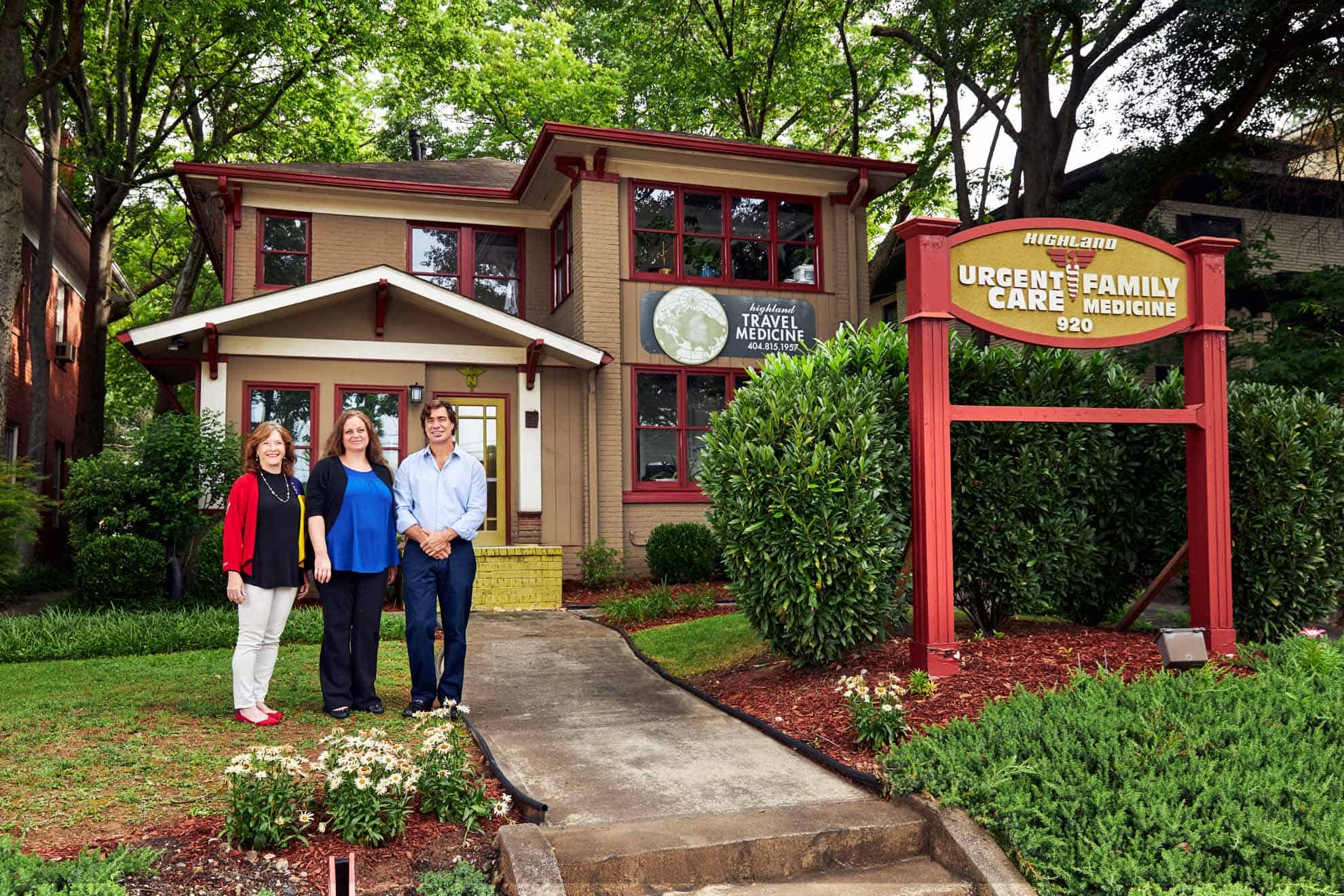 Highland Urgent Care & Family Medicine Team in front of office building