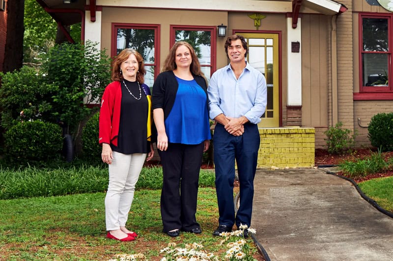 Highland Urgent Care & Family Medicine Team in front of office building